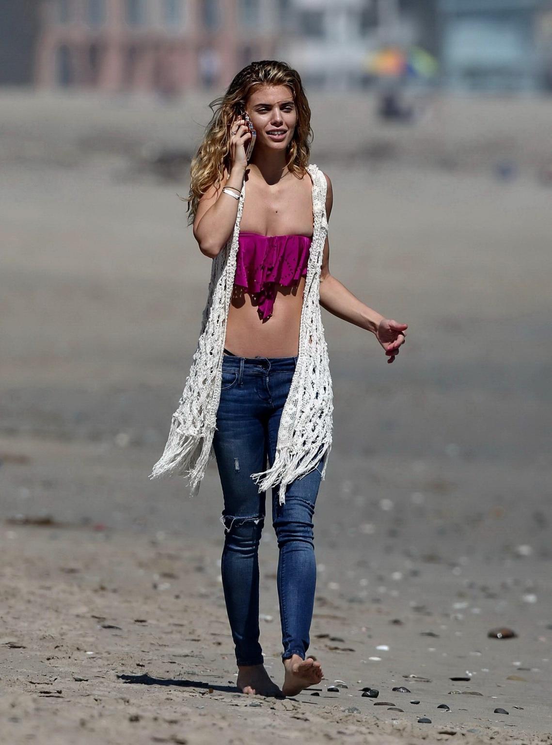 16P AnnaLynne McCord wearing a tube top  jeans on a beach in LA