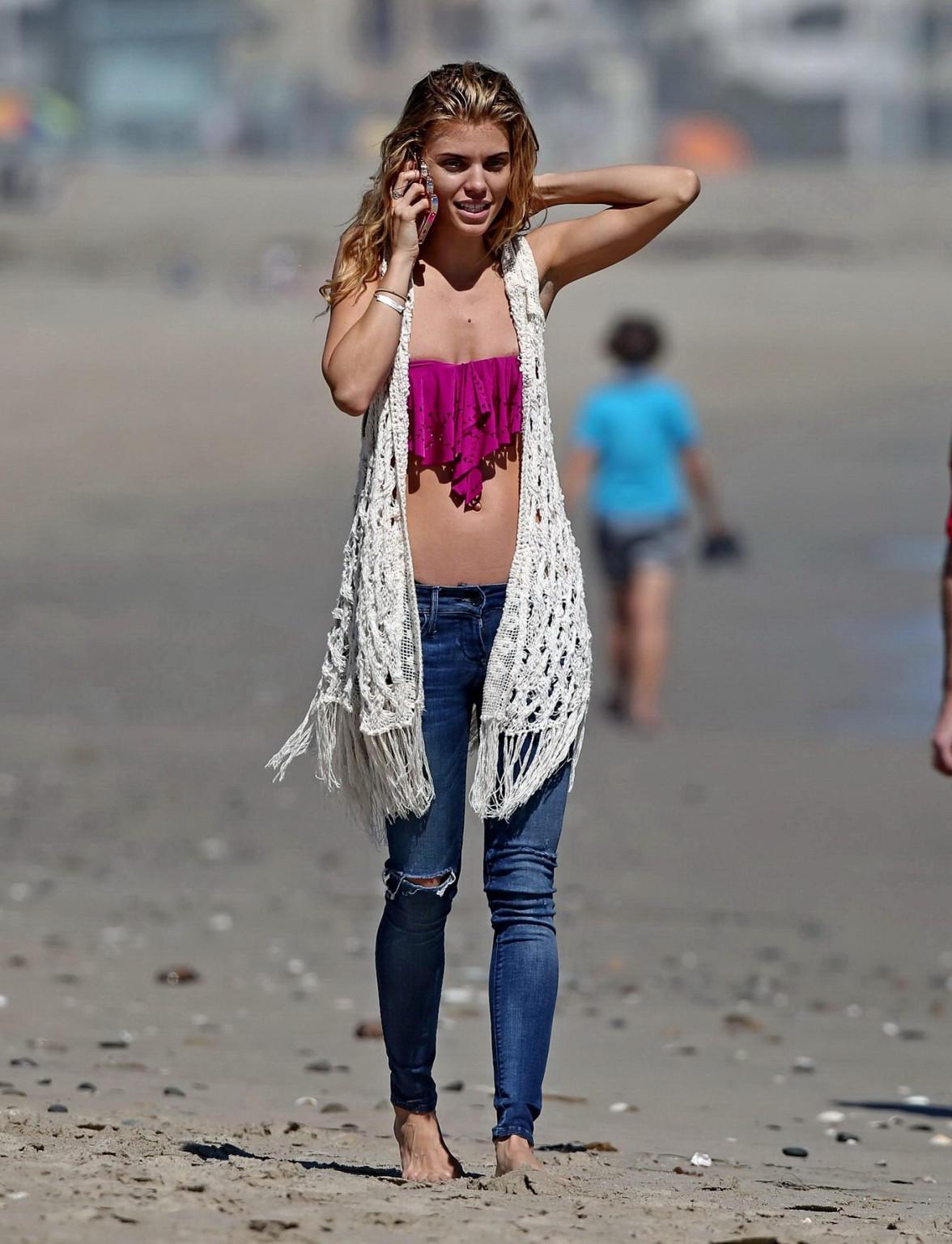 16P AnnaLynne McCord wearing a tube top  jeans on a beach in LA