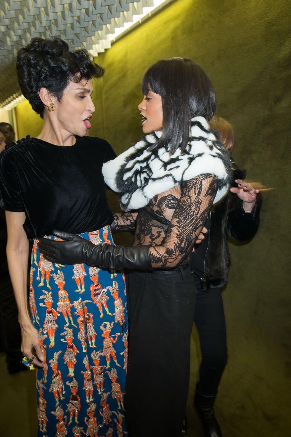 16P Rihanna braless in a black see-through top at Jean Paul Gaultier fashion show in