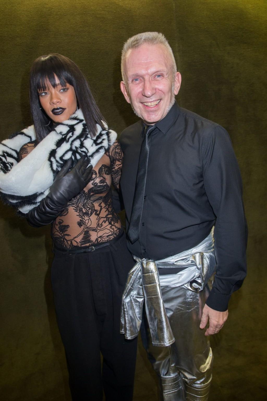16P Rihanna braless in a black see-through top at Jean Paul Gaultier fashion show in