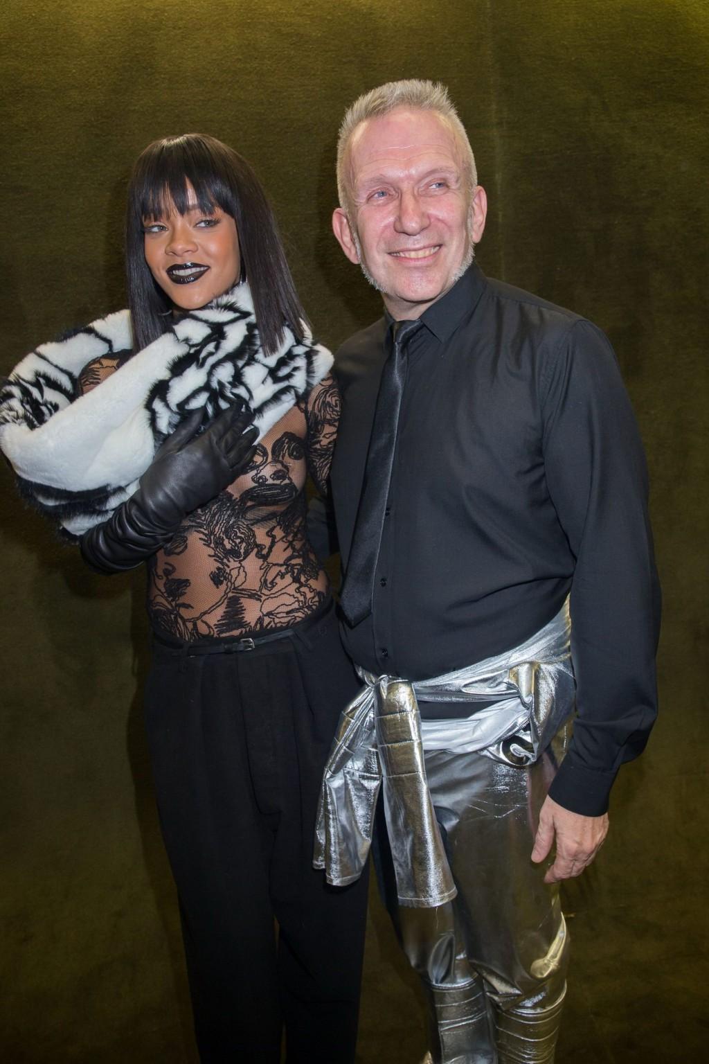 16P Rihanna braless in a black see-through top at Jean Paul Gaultier fashion show in