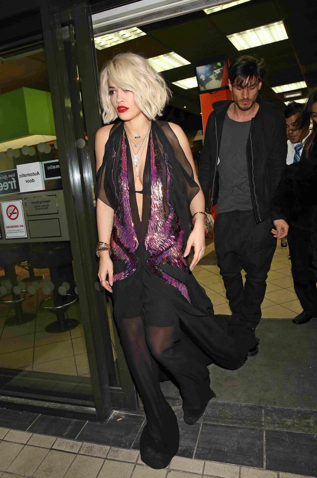 16P Rita Ora wearing revealing black see-through outfit at McDonalds in Holborn, Lon