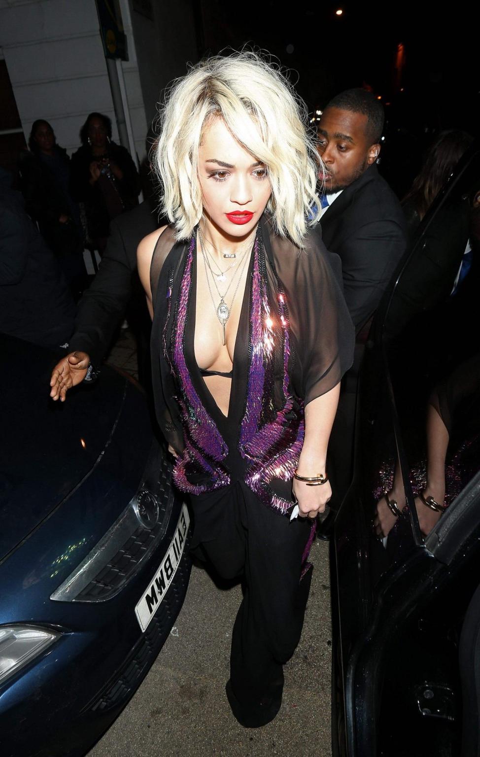 16P Rita Ora wearing revealing black see-through outfit at McDonalds in Holborn, Lon
