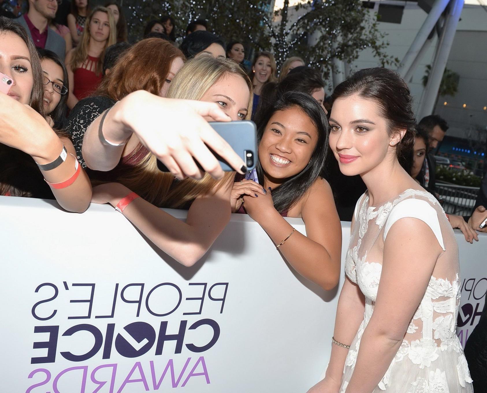 16P Adelaide Kane braless wearing a partially see through dress at the 40th annual P