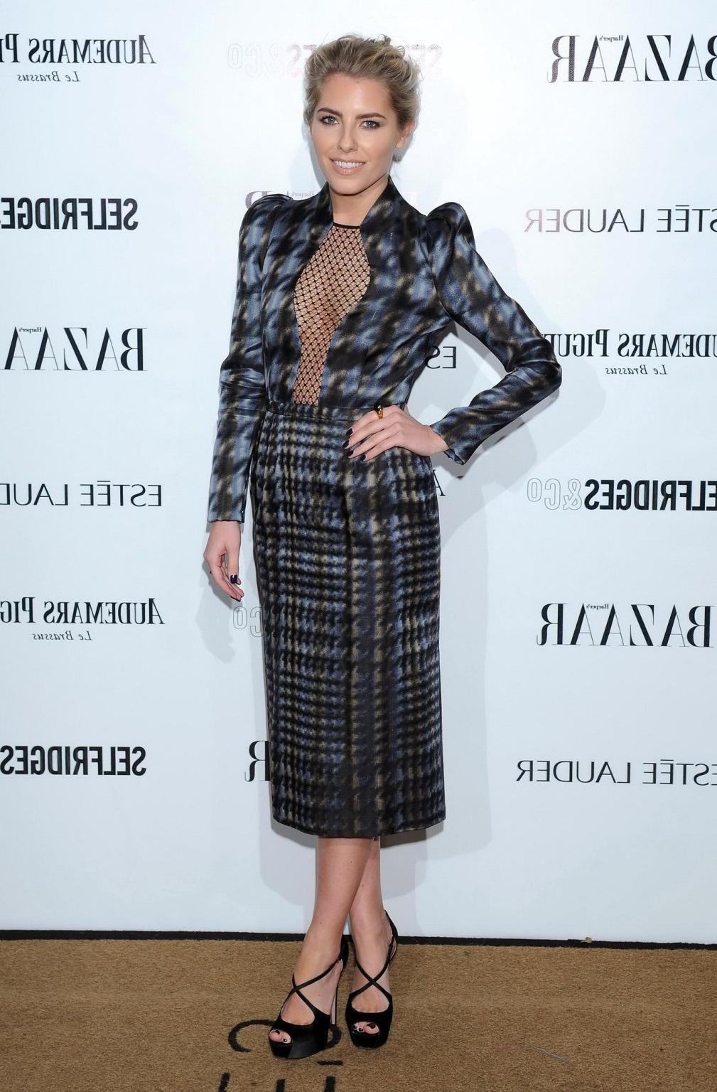 16P Mollie King braless wearing a partially see through top at the 5th Harper's Baza