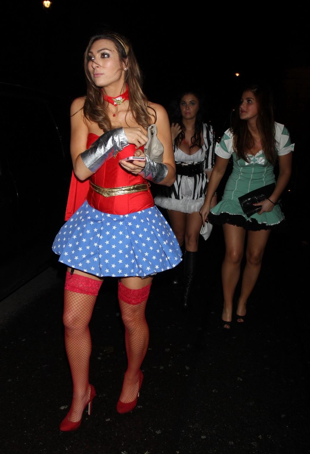 16P Luisa Zissman cleavy and leggy dressed as Wonder Woman for Halloween leaving Mah