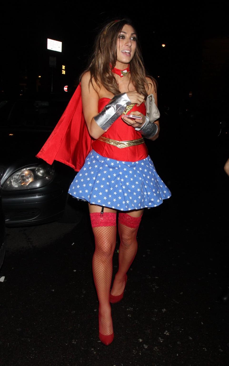 16P Luisa Zissman cleavy and leggy dressed as Wonder Woman for Halloween leaving Mah