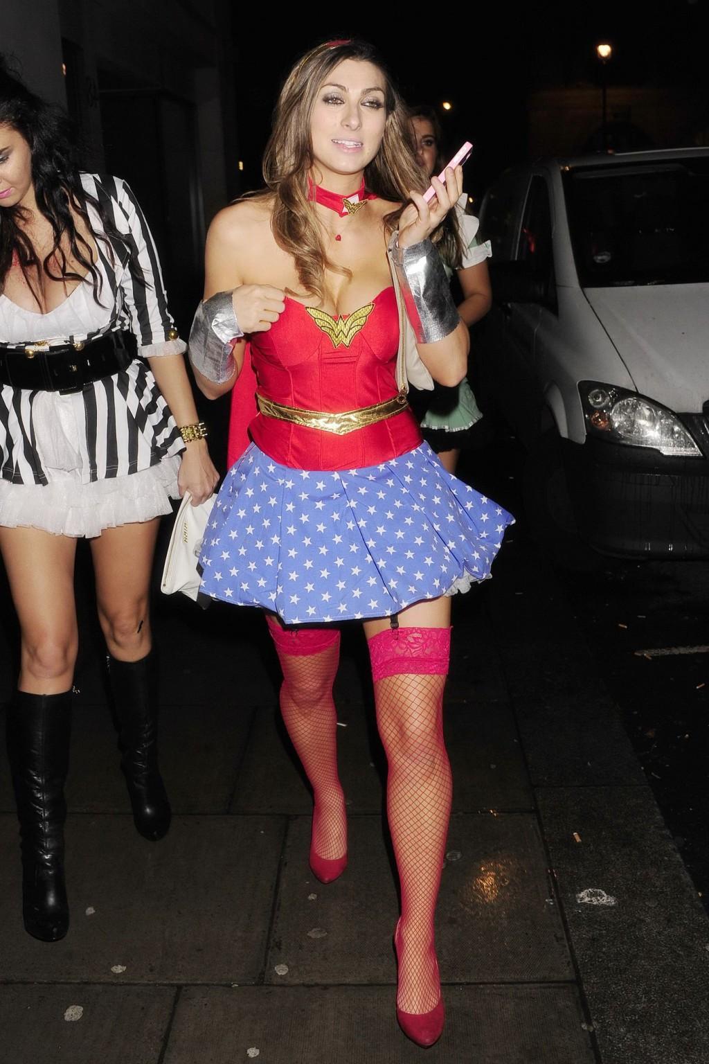 16P Luisa Zissman cleavy and leggy dressed as Wonder Woman for Halloween leaving Mah
