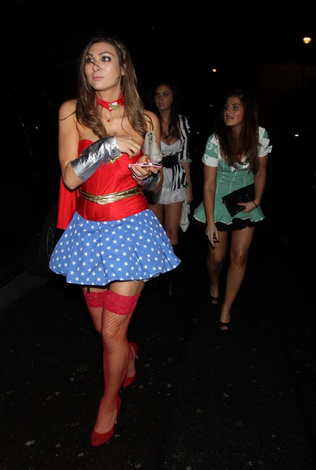 16P Luisa Zissman cleavy and leggy dressed as Wonder Woman for Halloween leaving Mah
