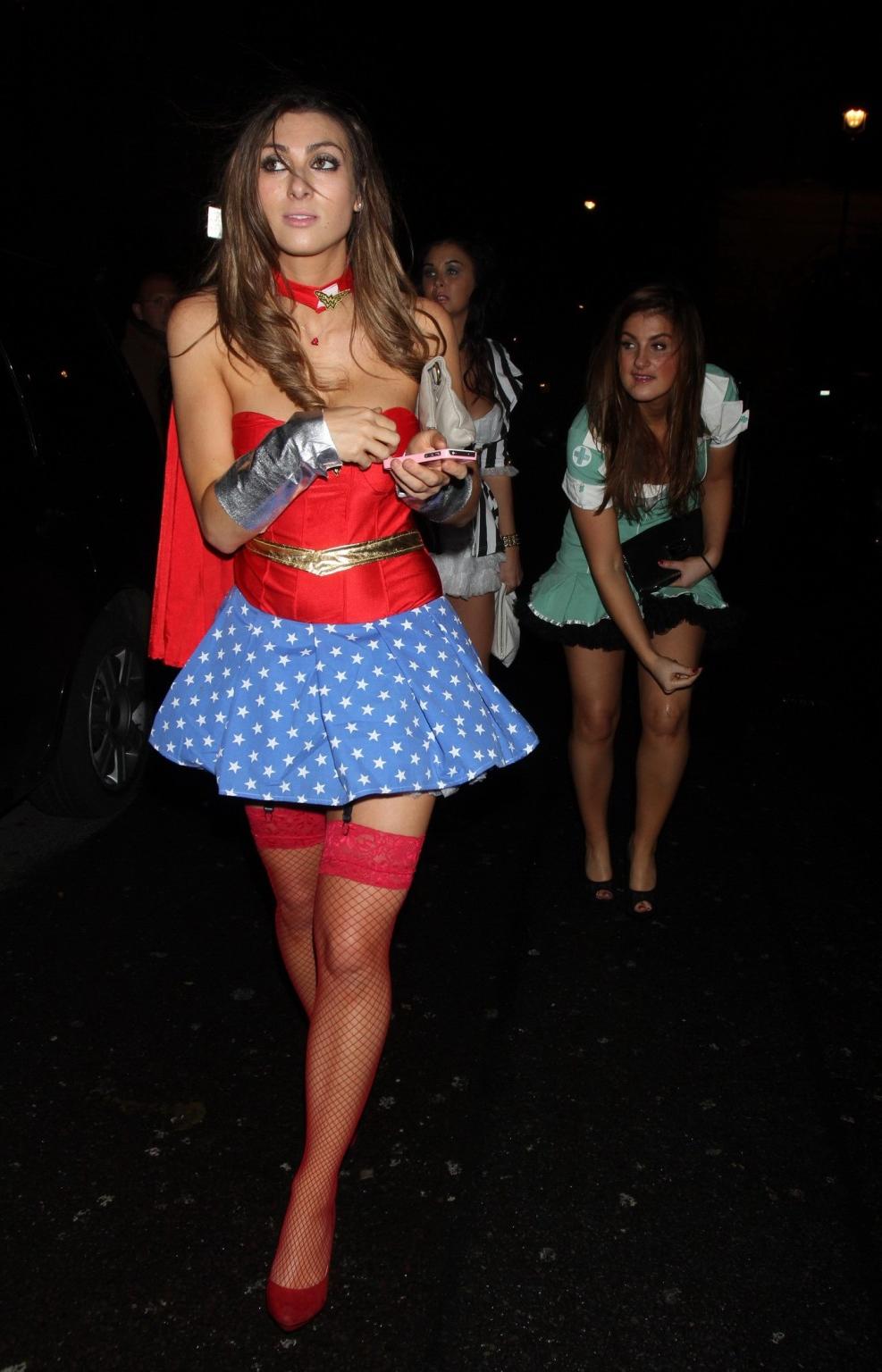 16P Luisa Zissman cleavy and leggy dressed as Wonder Woman for Halloween leaving Mah