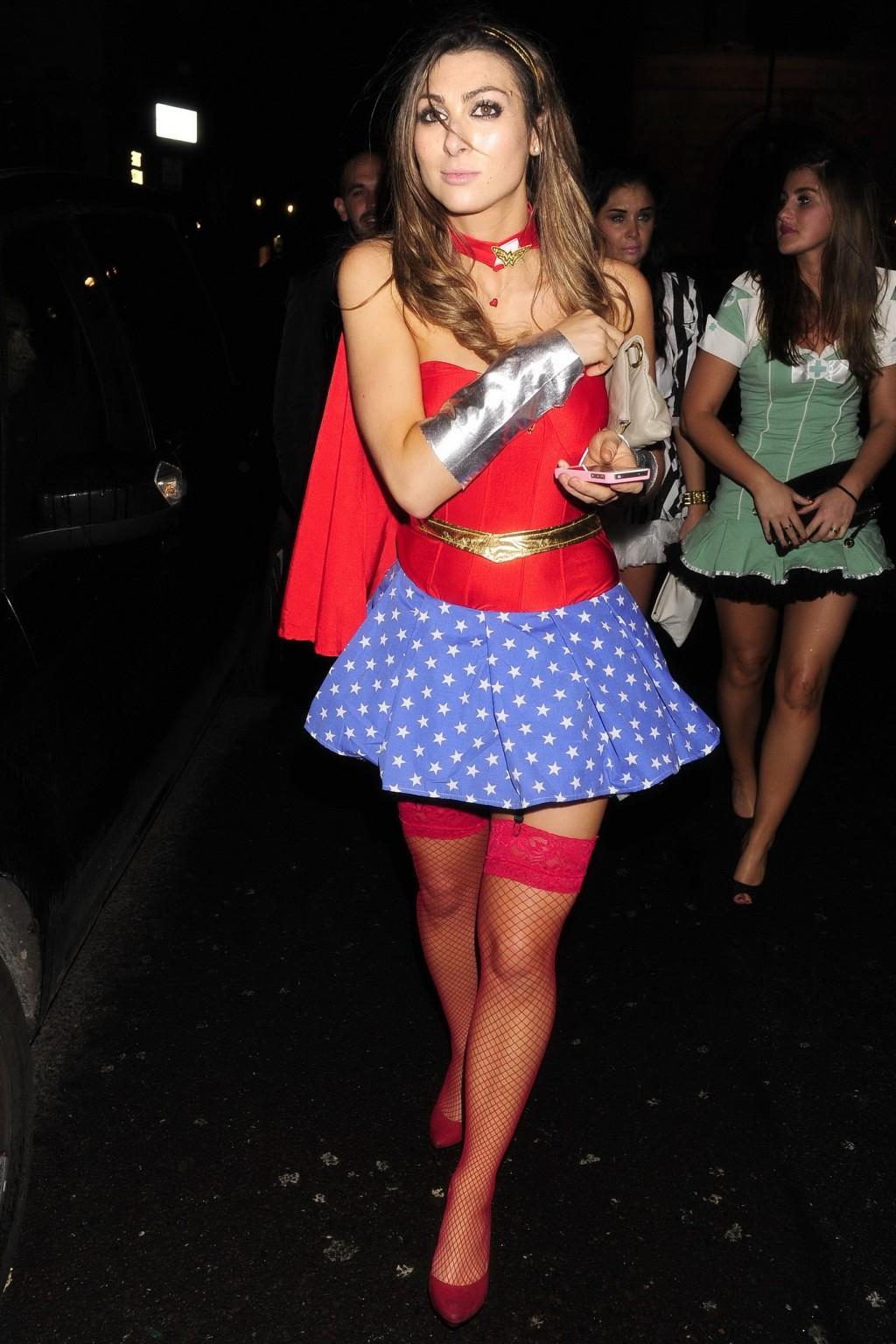 16P Luisa Zissman cleavy and leggy dressed as Wonder Woman for Halloween leaving Mah
