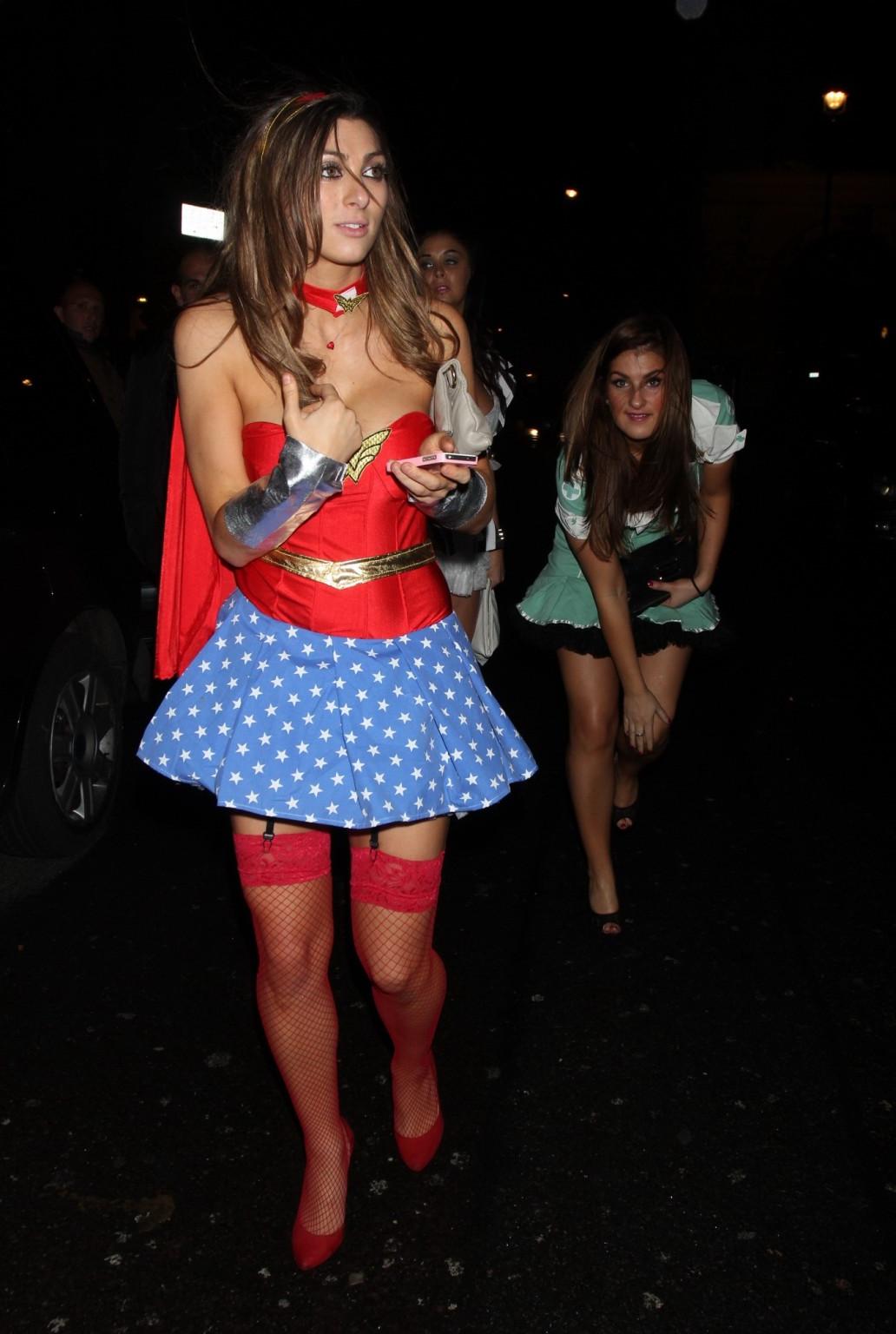 16P Luisa Zissman cleavy and leggy dressed as Wonder Woman for Halloween leaving Mah