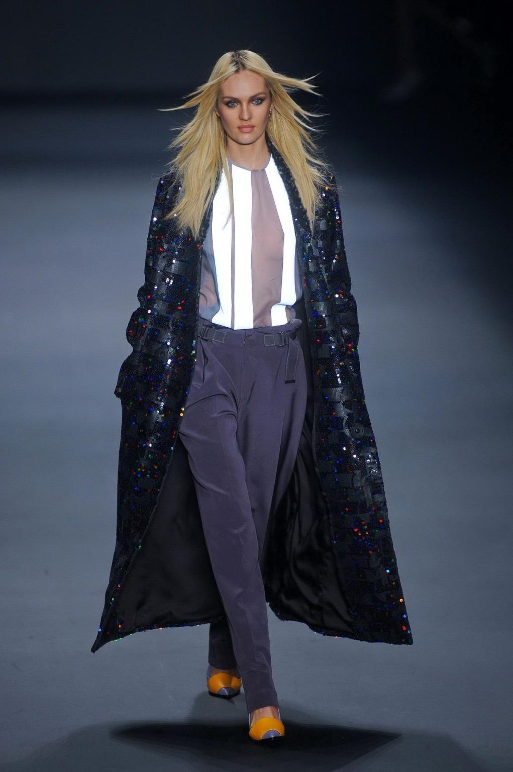16P Candice Swanepoel shows off her boobs wearing a see through top on the catwalk a