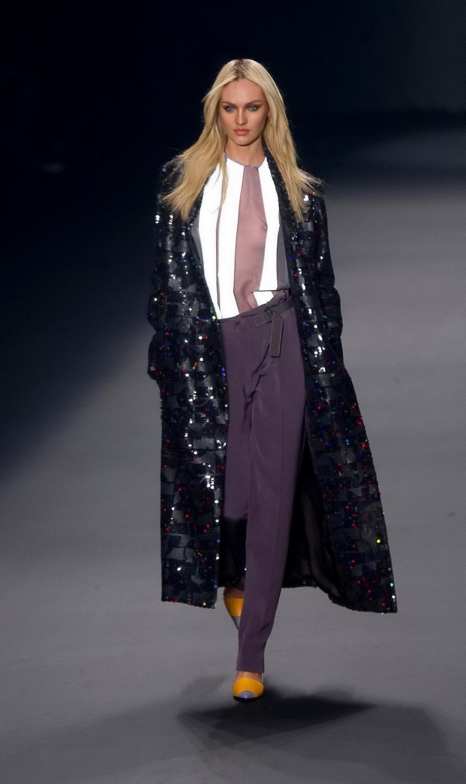 16P Candice Swanepoel shows off her boobs wearing a see through top on the catwalk a