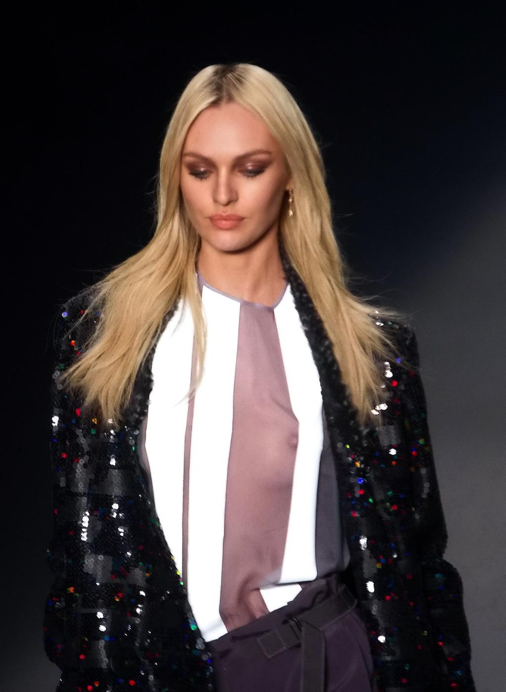 16P Candice Swanepoel shows off her boobs wearing a see through top on the catwalk a