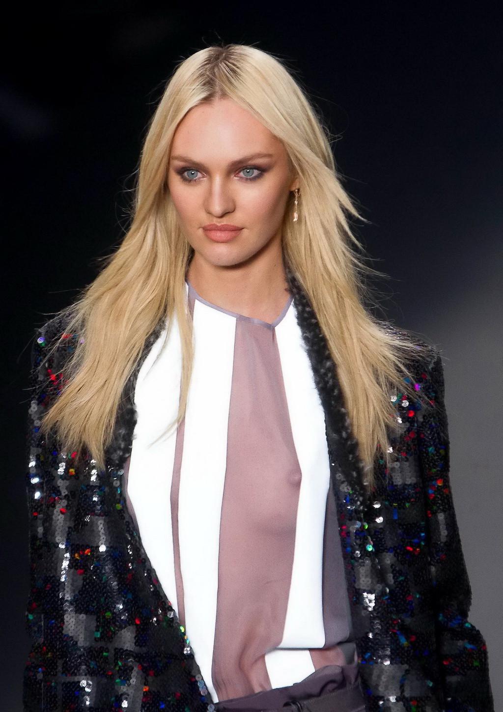 16P Candice Swanepoel shows off her boobs wearing a see through top on the catwalk a