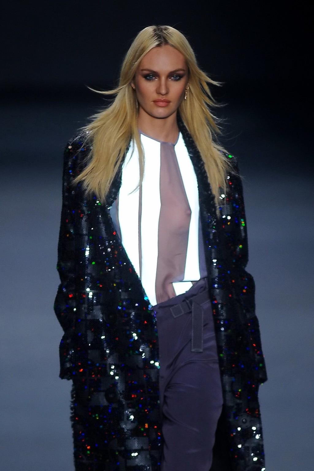 16P Candice Swanepoel shows off her boobs wearing a see through top on the catwalk a