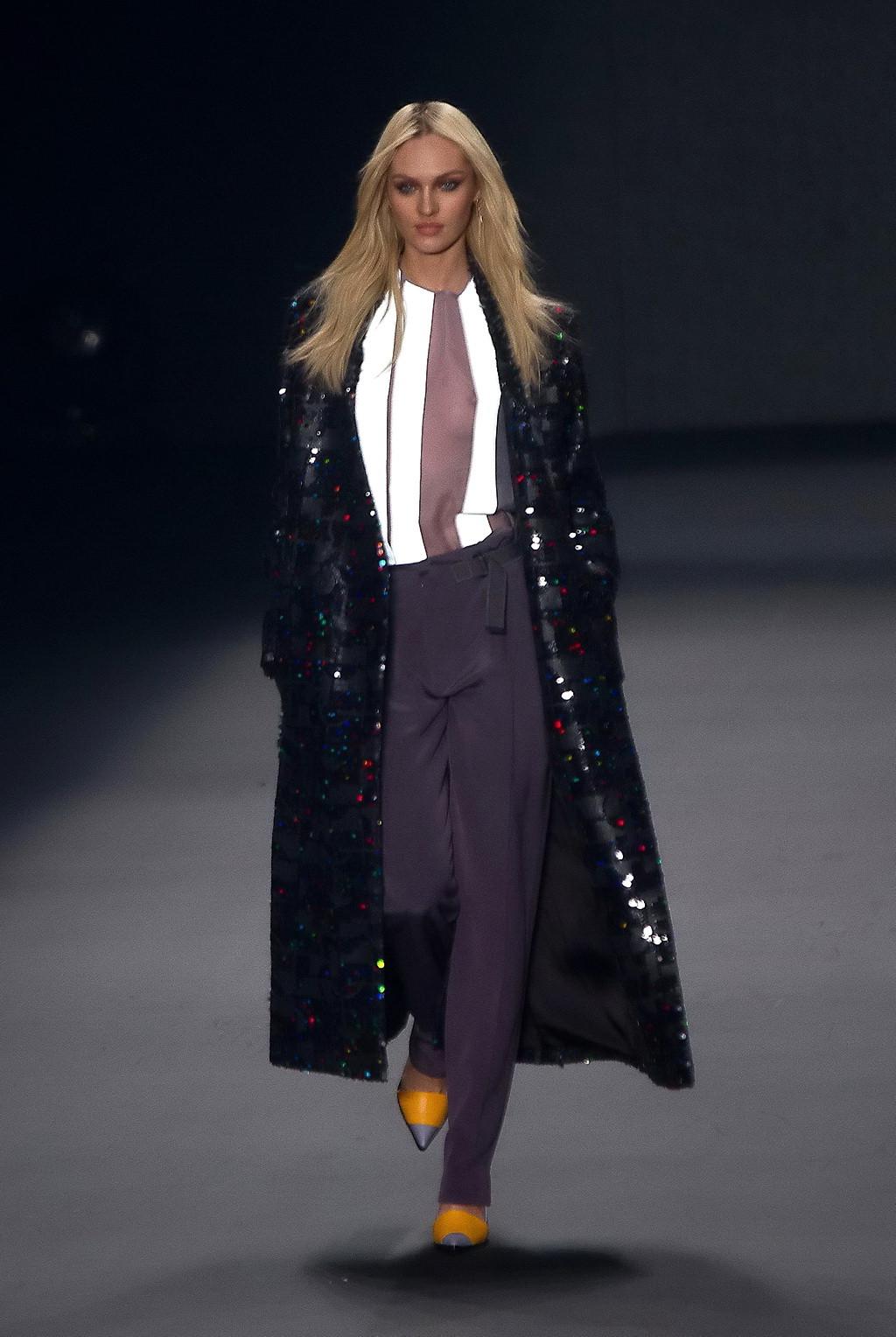 16P Candice Swanepoel shows off her boobs wearing a see through top on the catwalk a
