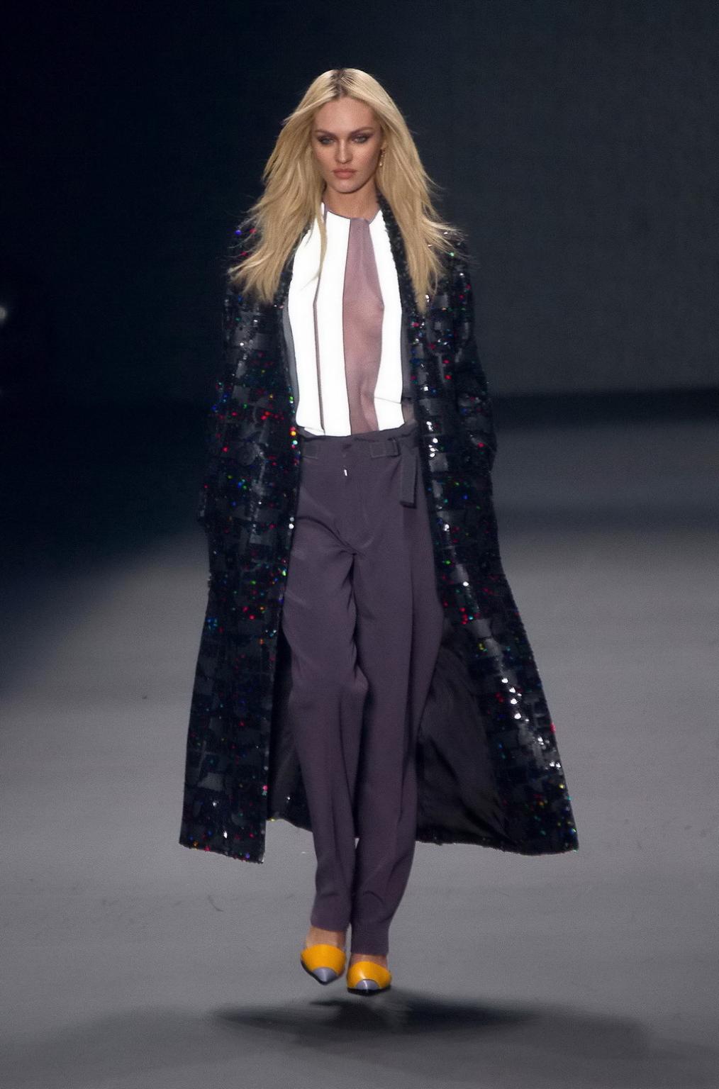 16P Candice Swanepoel shows off her boobs wearing a see through top on the catwalk a