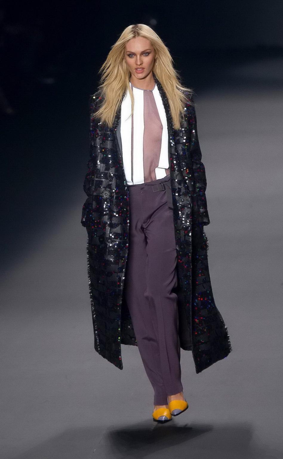 16P Candice Swanepoel shows off her boobs wearing a see through top on the catwalk a