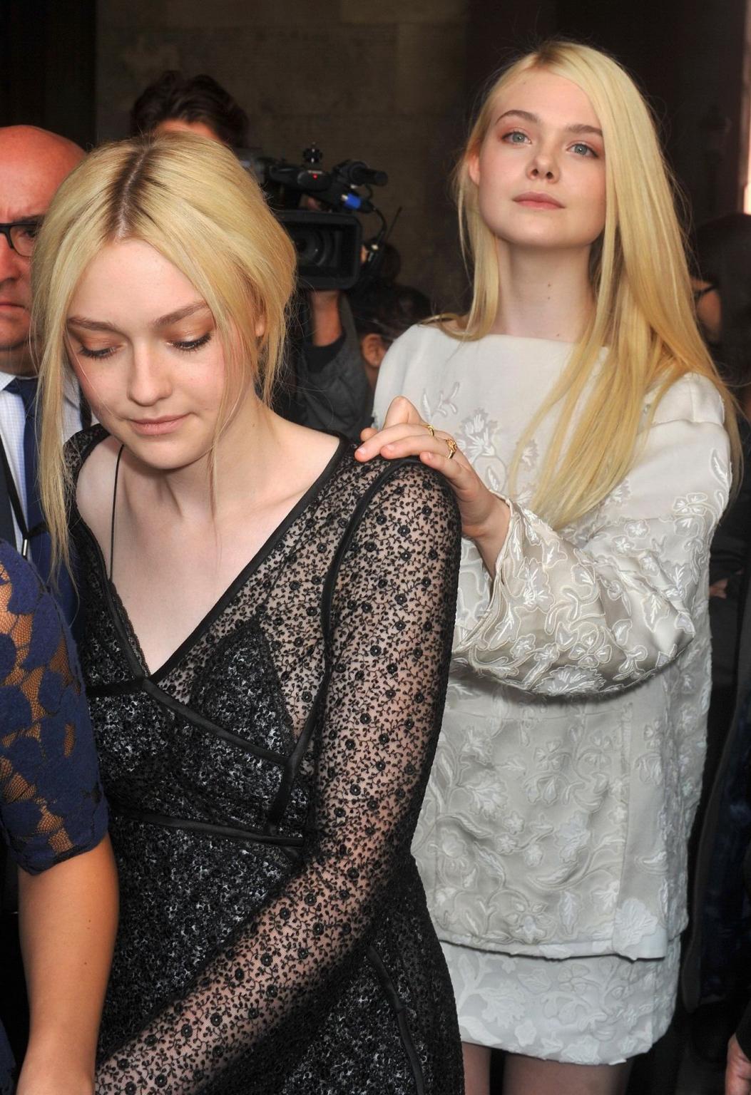 16P Dakota Fanning wearing black see-through dress at Louis Vuitton Spring 2014 Fash