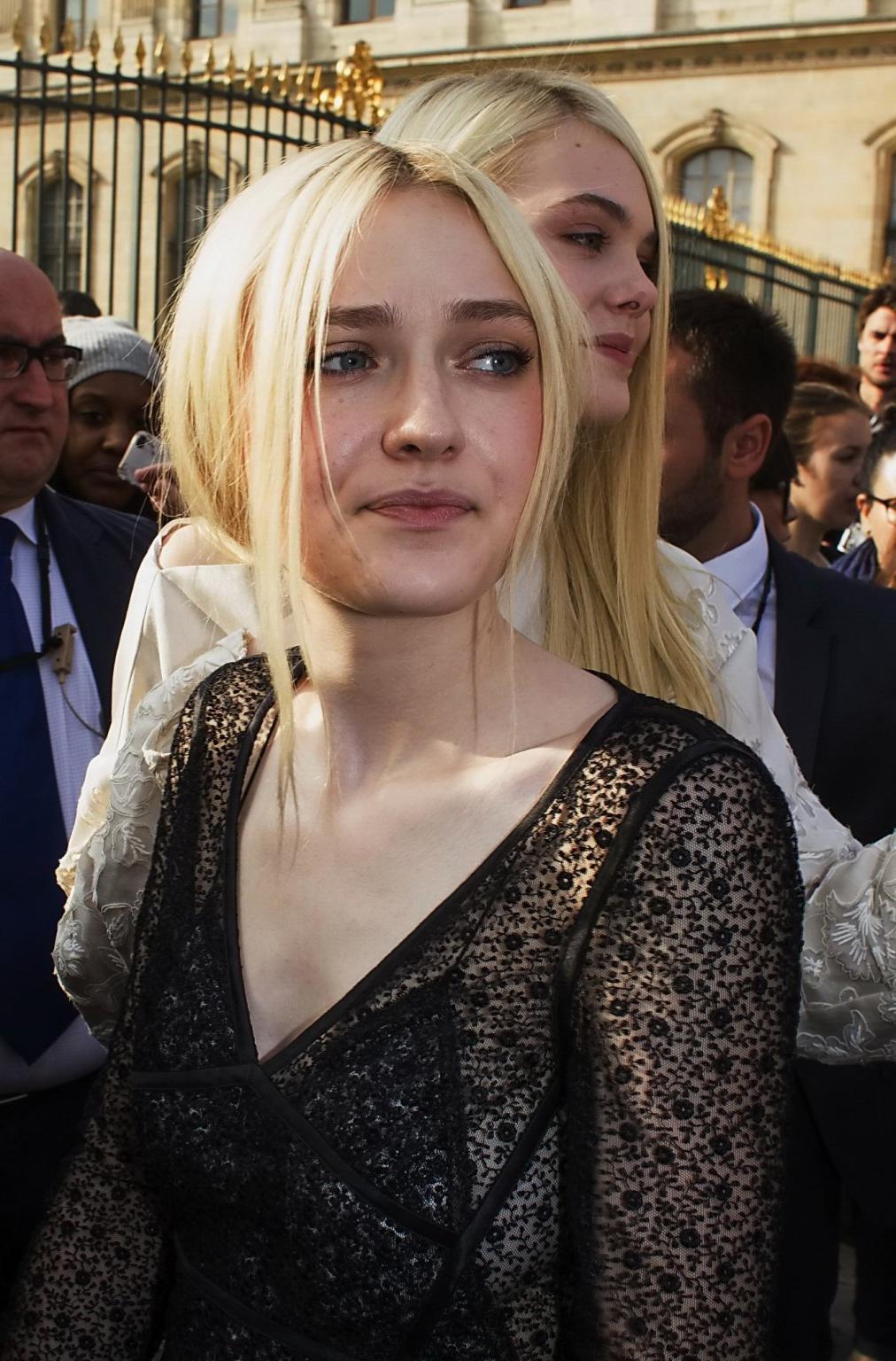 16P Dakota Fanning wearing black see-through dress at Louis Vuitton Spring 2014 Fash
