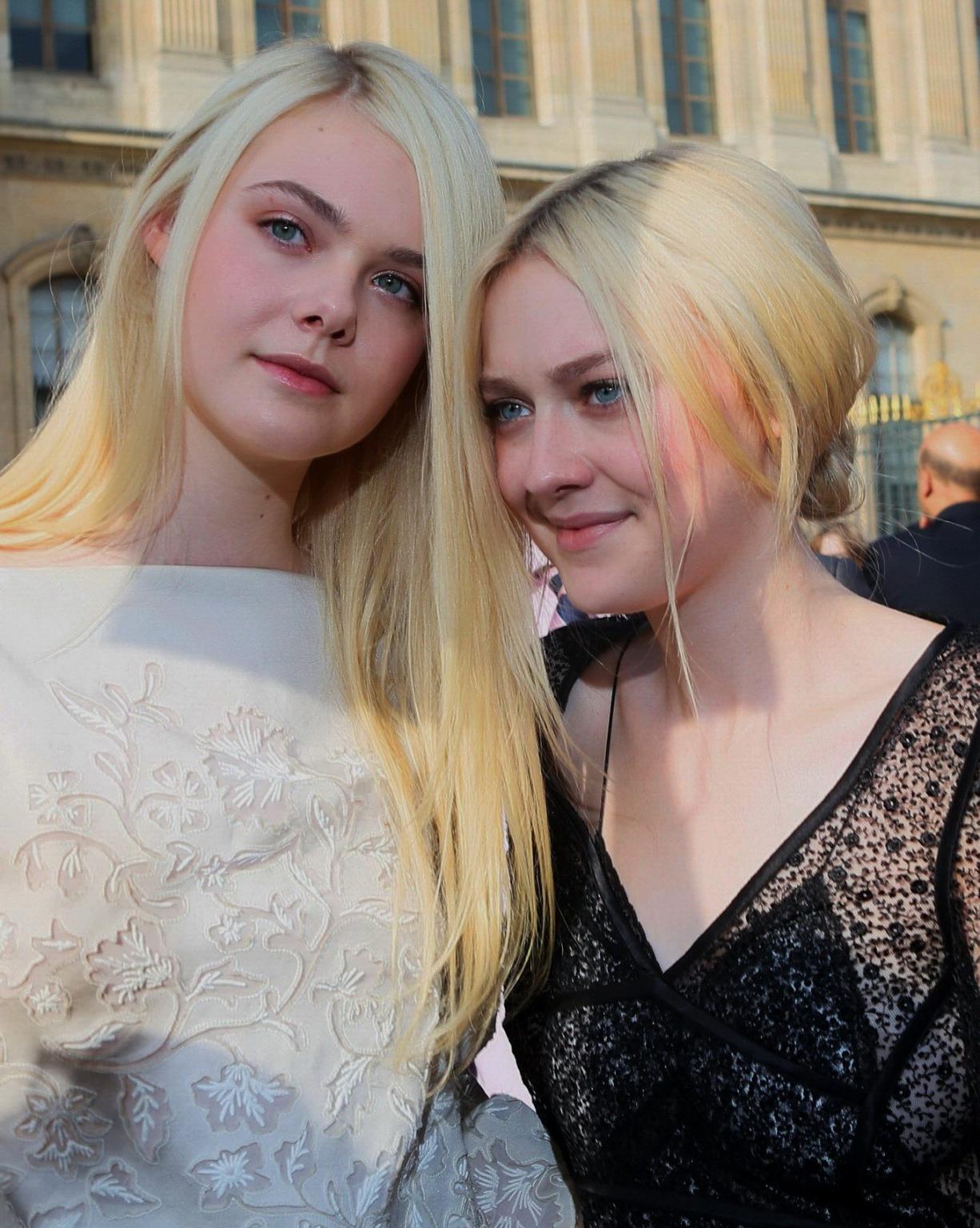 16P Dakota Fanning wearing black see-through dress at Louis Vuitton Spring 2014 Fash