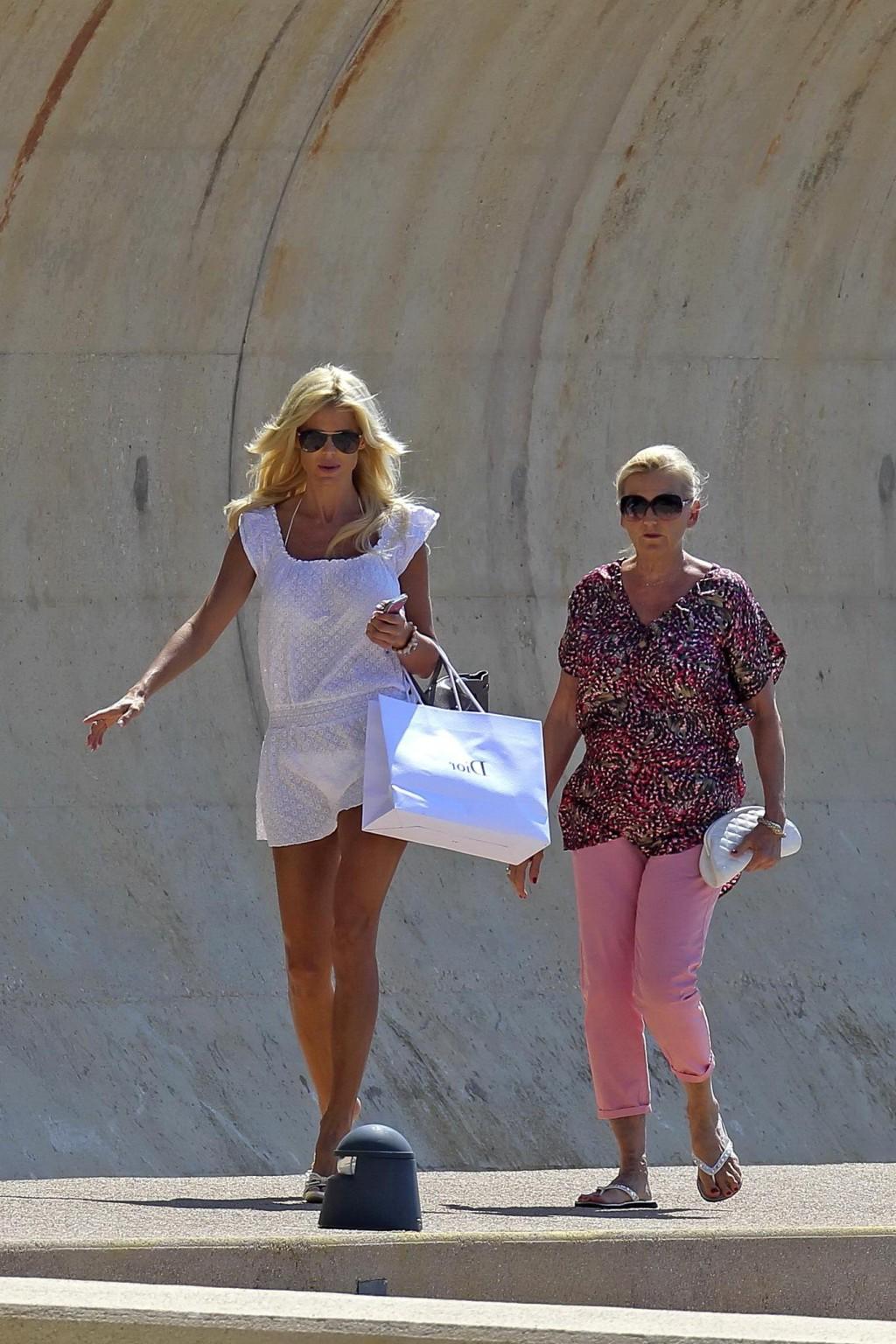 16P Victoria Silvstedt see through to bikini while heading to a yach in France