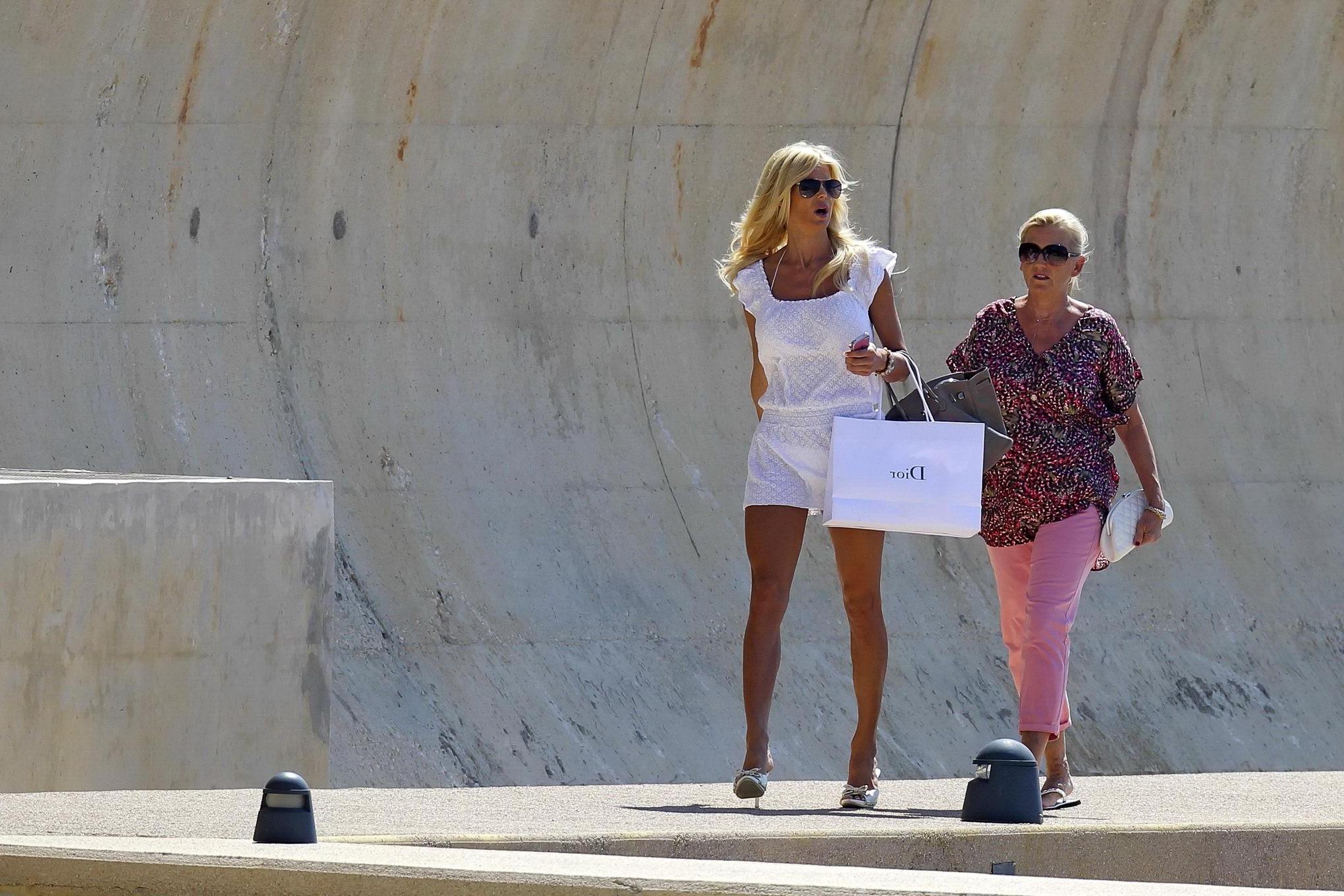 16P Victoria Silvstedt see through to bikini while heading to a yach in France