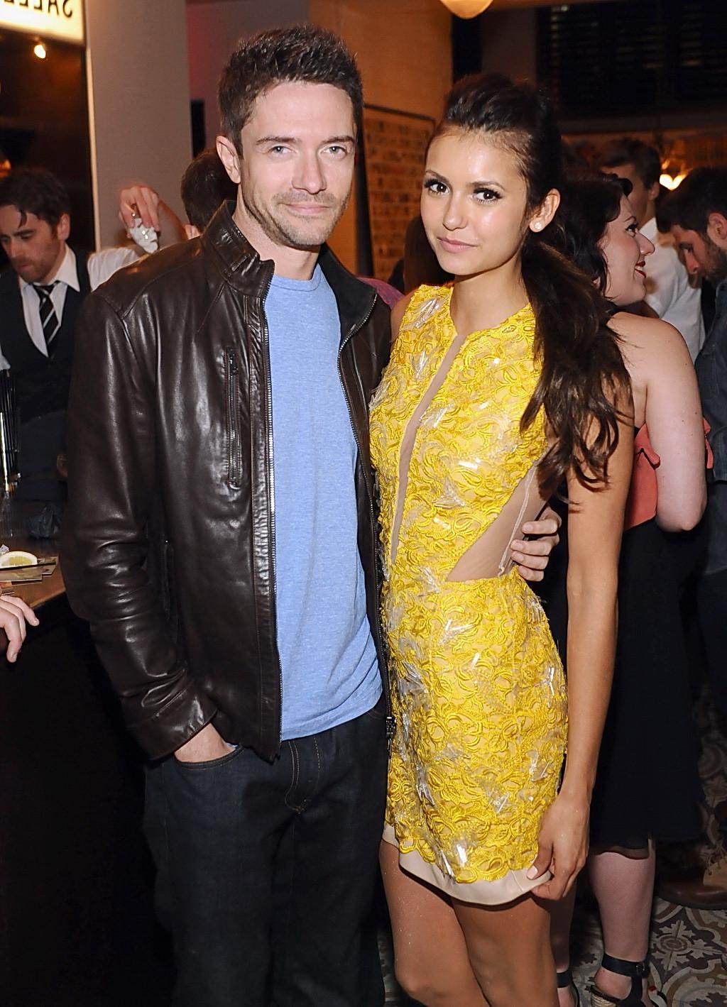 16P Nina Dobrev braless wearing yellow partially see-through mini dress at Cosmopoli