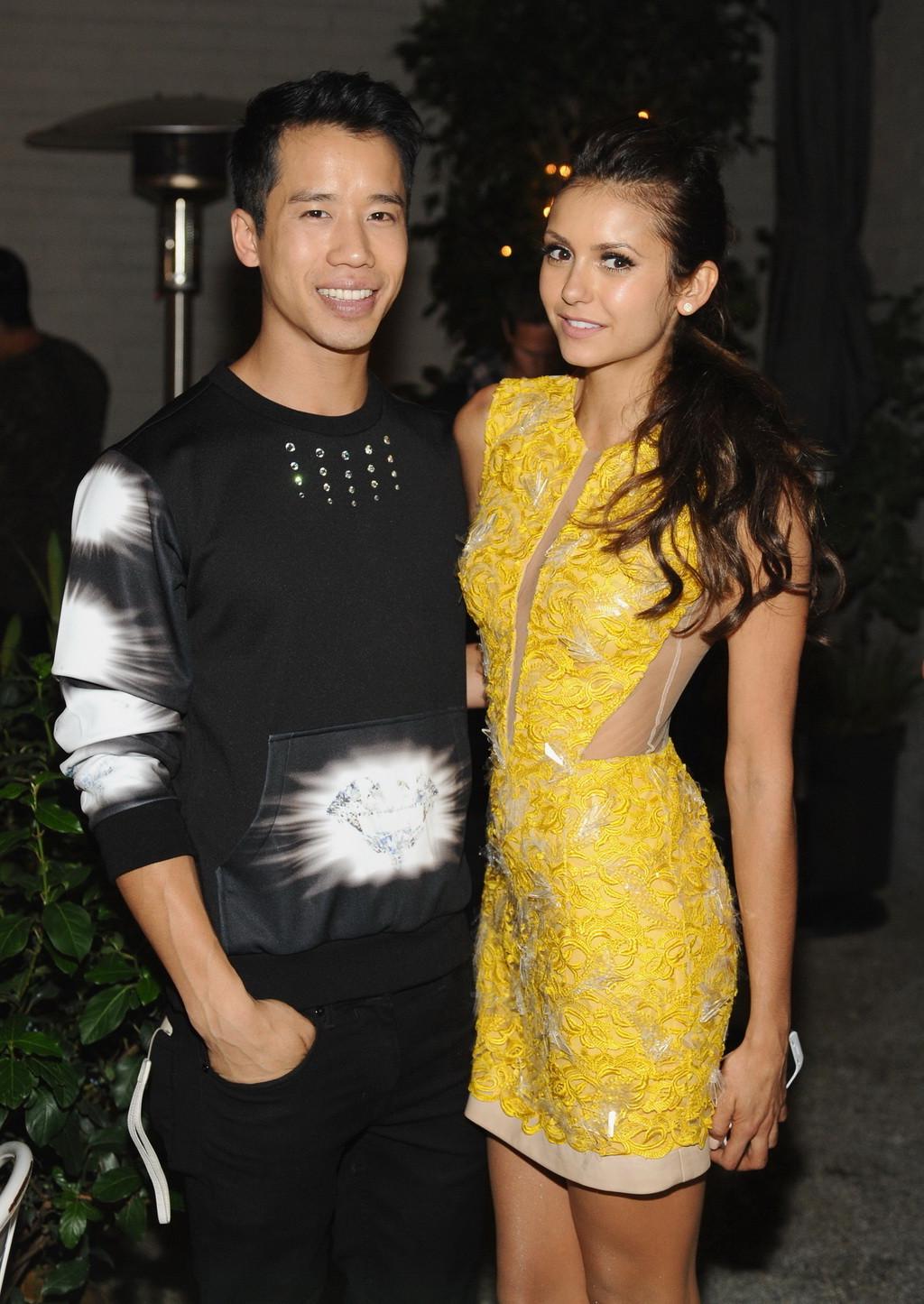 16P Nina Dobrev braless wearing yellow partially see-through mini dress at Cosmopoli