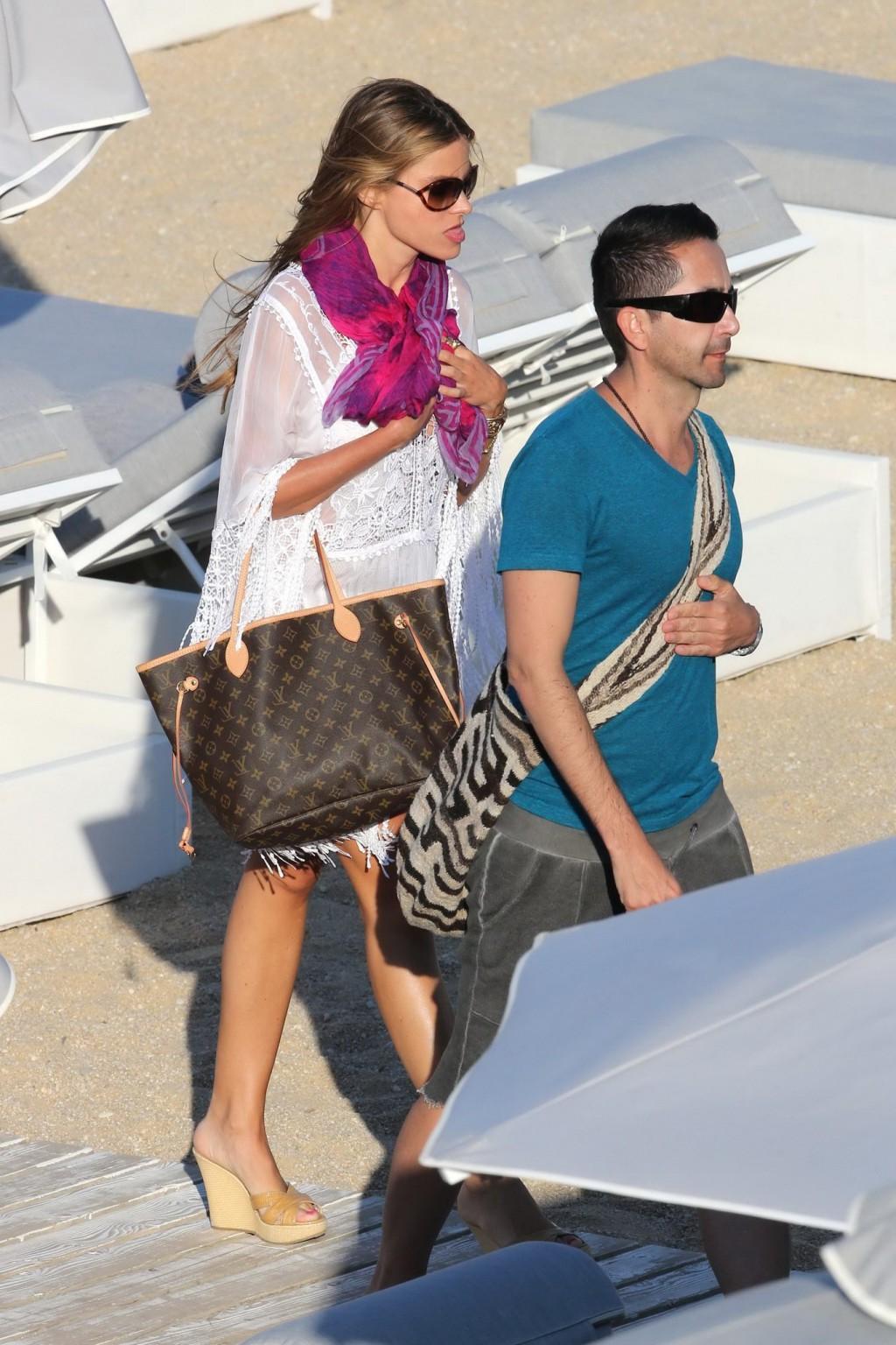 16P Sofia Vergara see-through to white bikini arriving at the beach in Mykonis