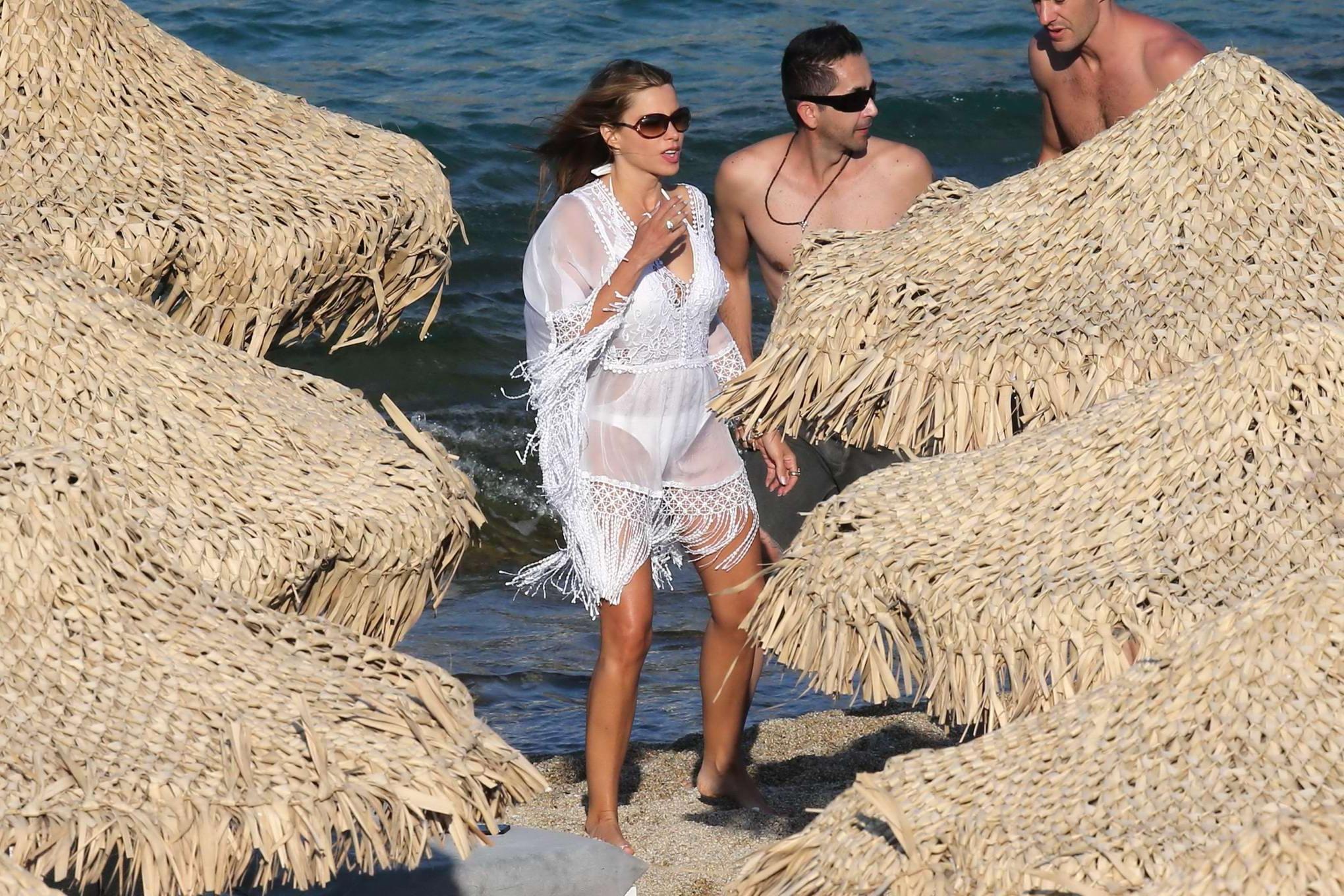 16P Sofia Vergara see-through to white bikini arriving at the beach in Mykonis