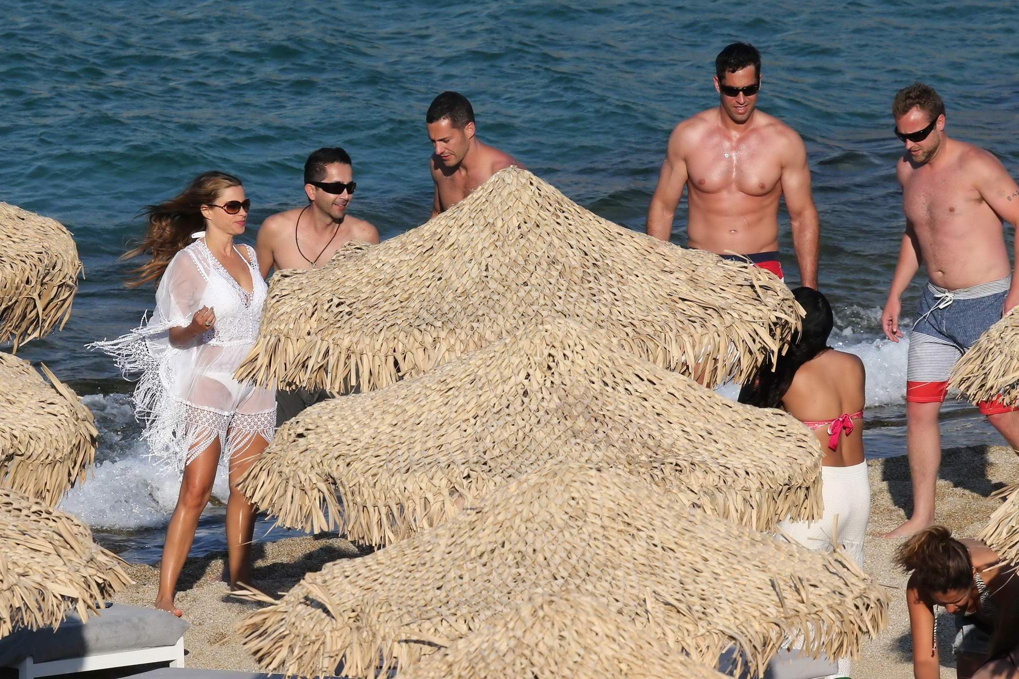 16P Sofia Vergara see-through to white bikini arriving at the beach in Mykonis