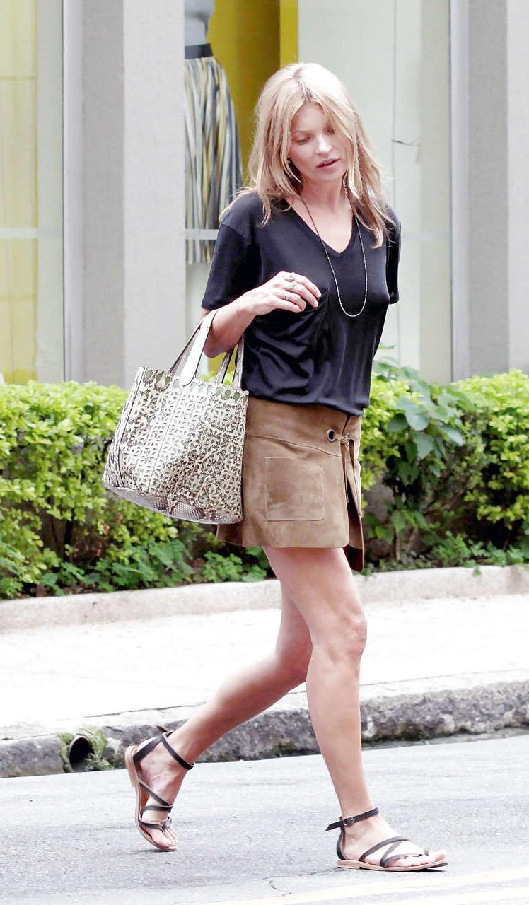 16P Kate Moss exposing up skirt and see thru on street