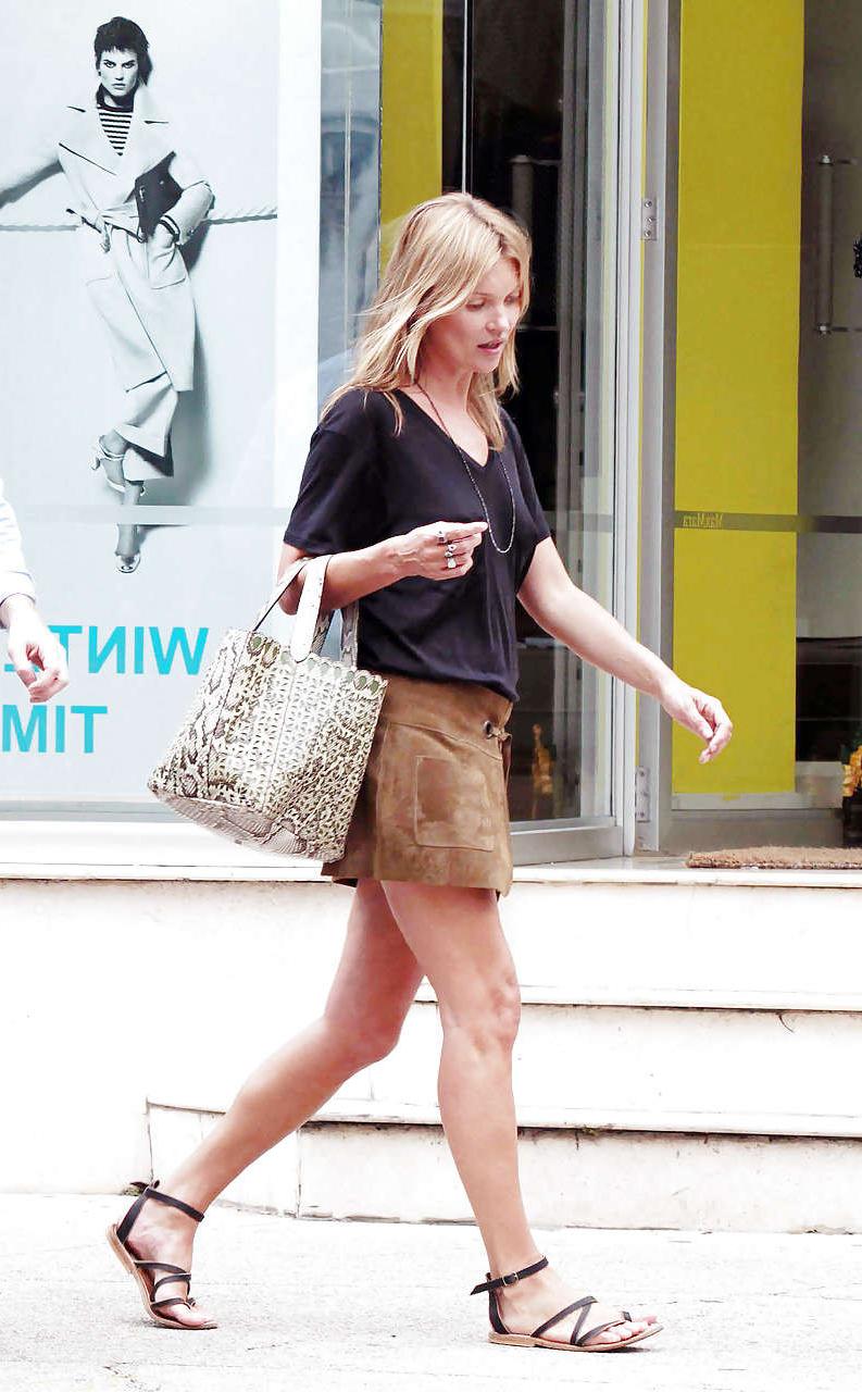 16P Kate Moss exposing up skirt and see thru on street