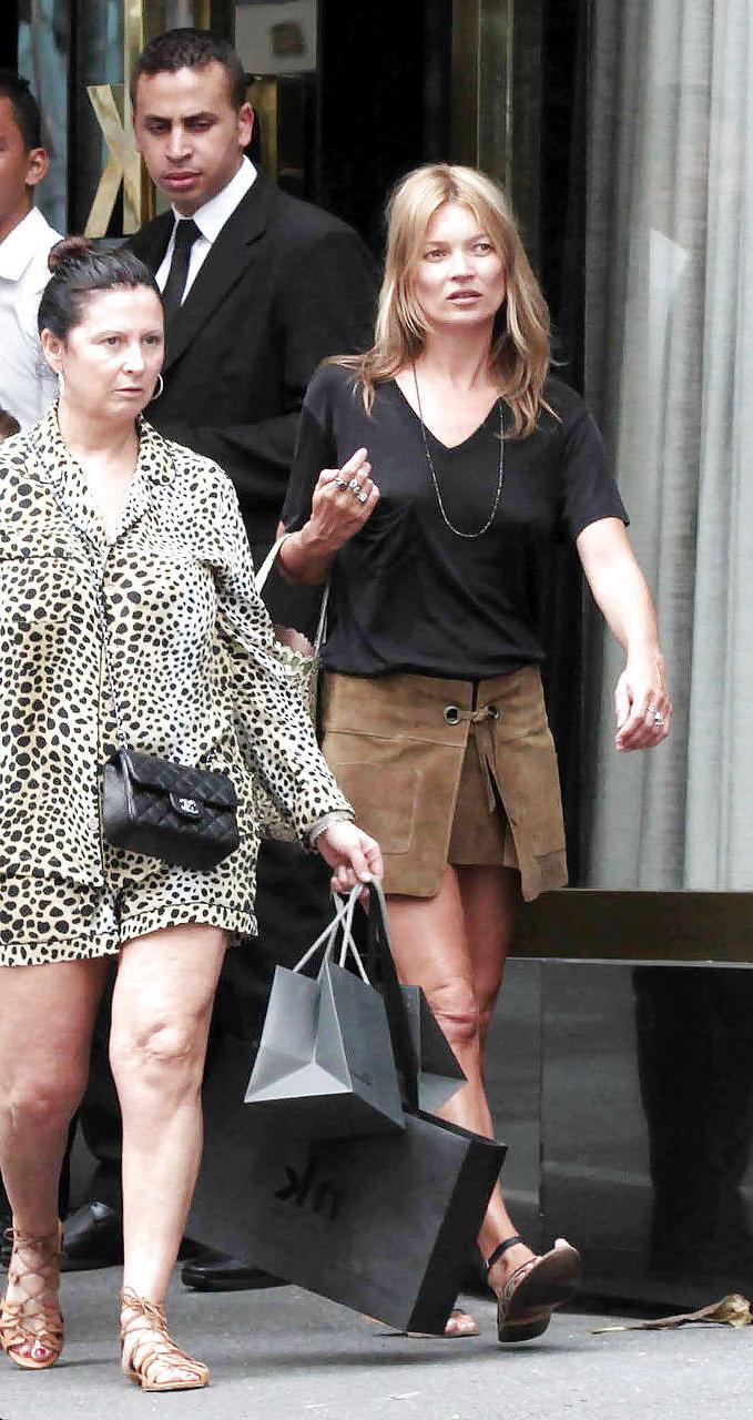 16P Kate Moss exposing up skirt and see thru on street