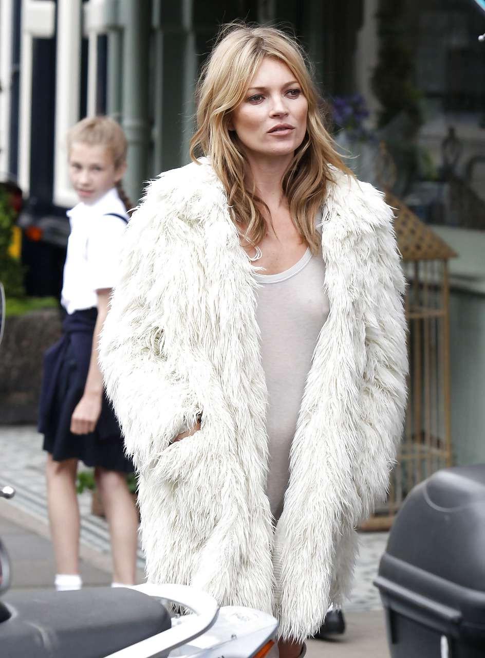 16P Kate Moss exposing up skirt and see thru on street