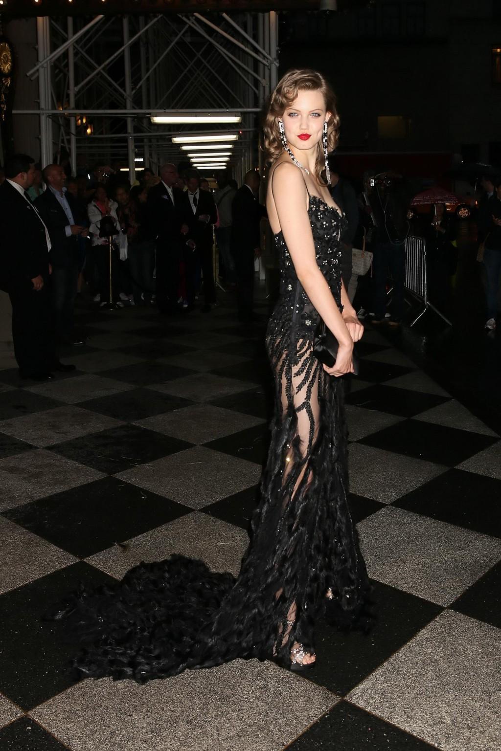 16P Lindsey Wixson shows off her ass wearing a partially see through dress at the at