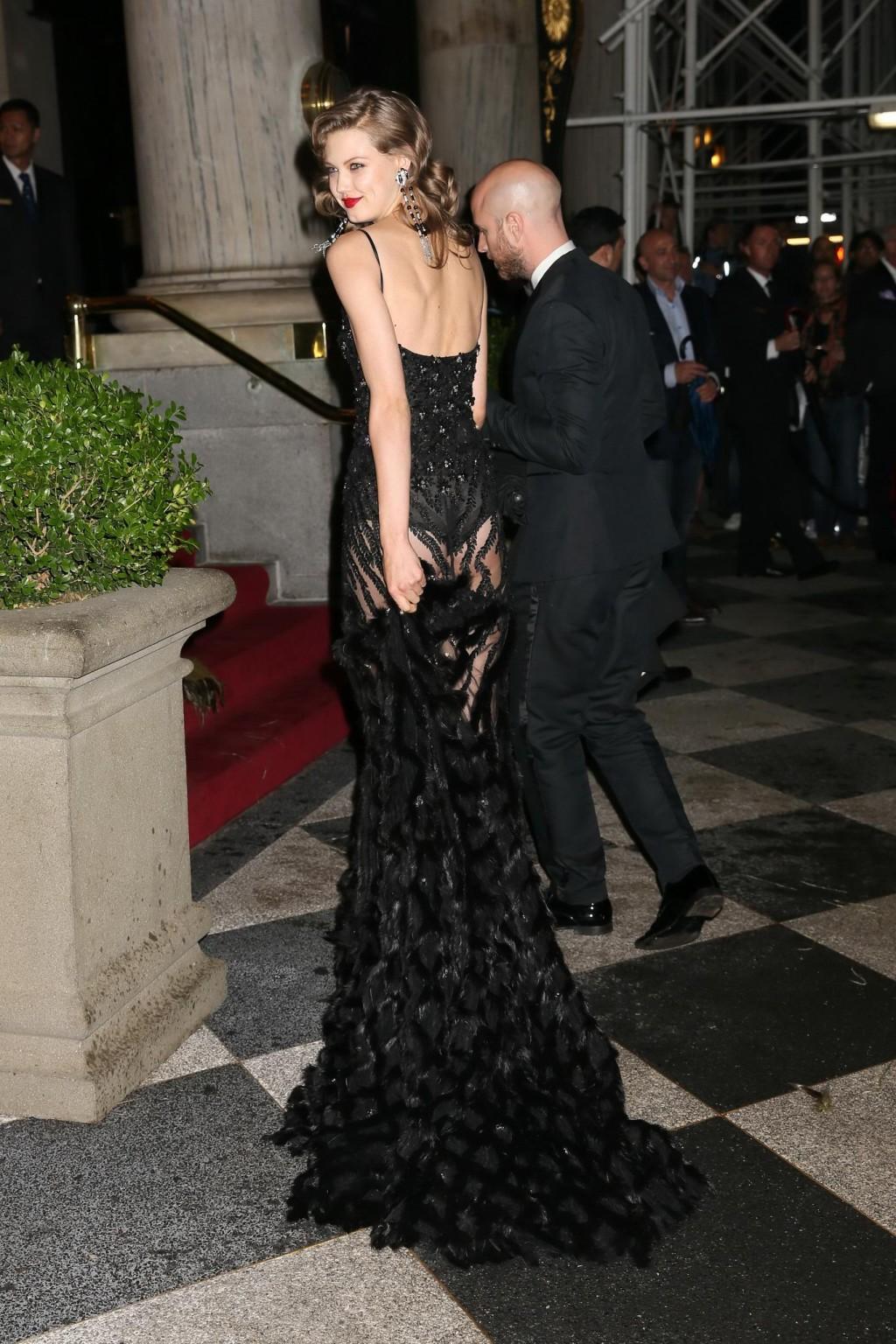 16P Lindsey Wixson shows off her ass wearing a partially see through dress at the at