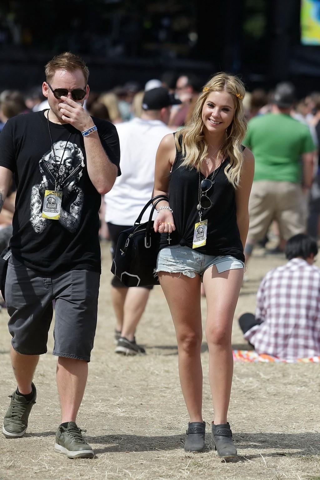 16P Ashley Benson wearing transparent tank top and hotpants at the Bandeau festival 