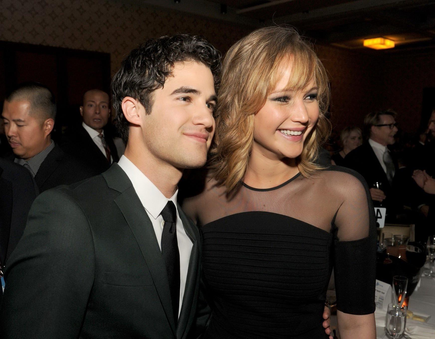 16P Jennifer Lawrence wearing black partially see-thru mini dress at 24th Annual GLA