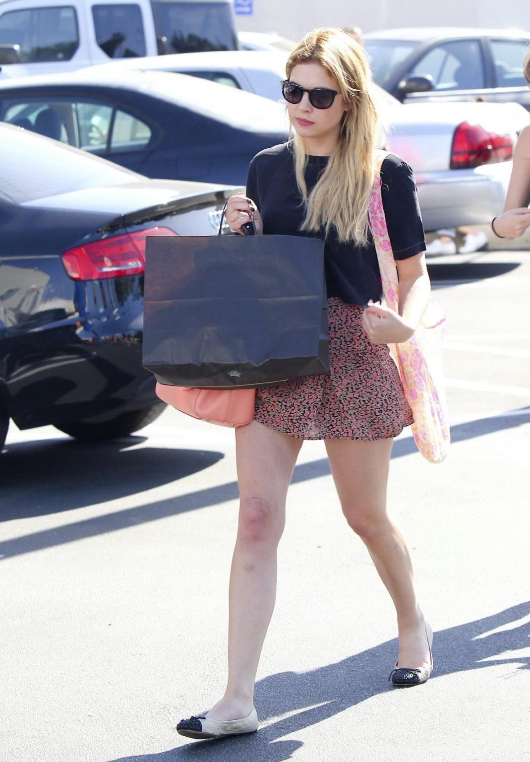 16P Ashley Benson wearing fluttering see-thru mini skirt while shopping in Studio Ci