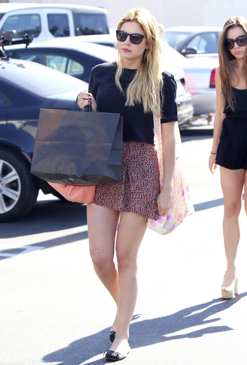 16P Ashley Benson wearing fluttering see-thru mini skirt while shopping in Studio Ci