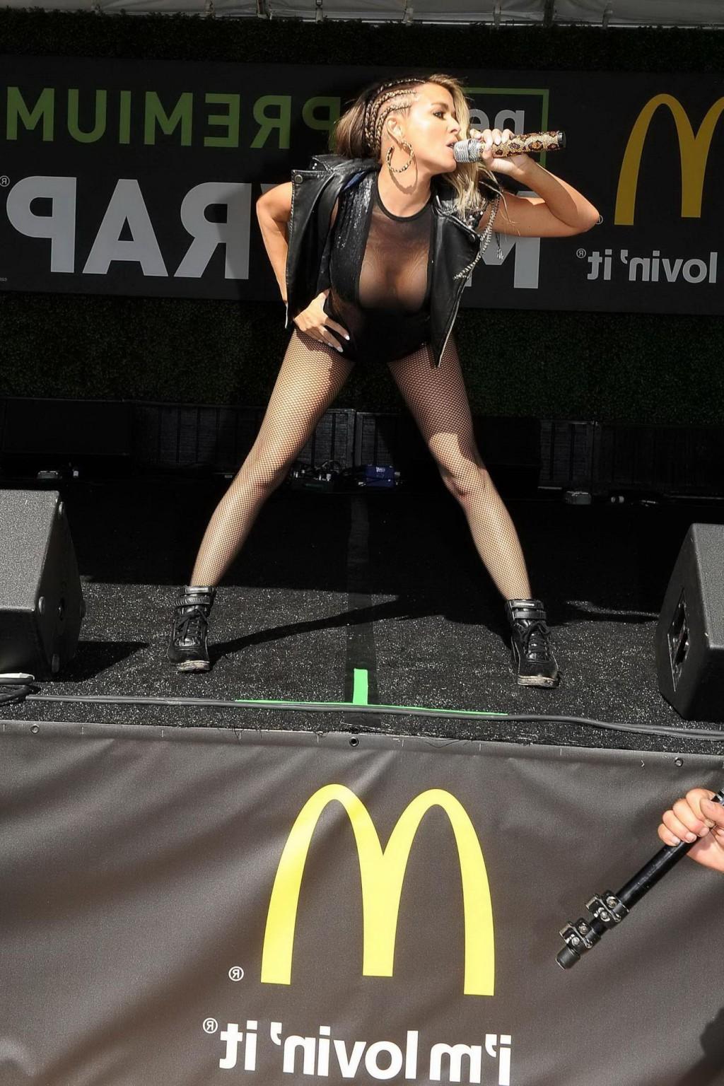 16P Carmen Electra braless wearing see-thru outfit and stockings while performs at B