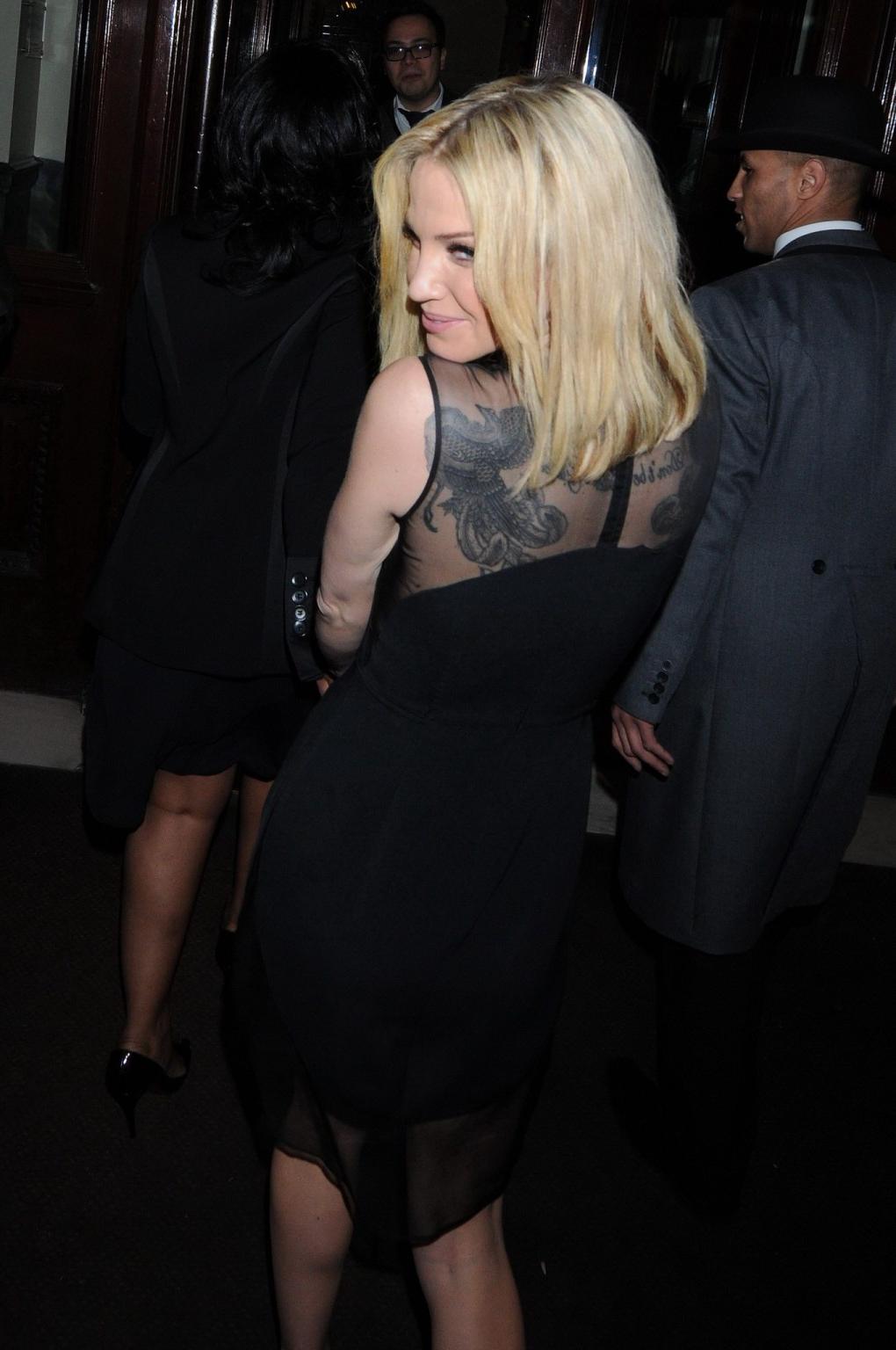 16P Braless Sarah Harding shows side boob wearing a partially see through dress for 