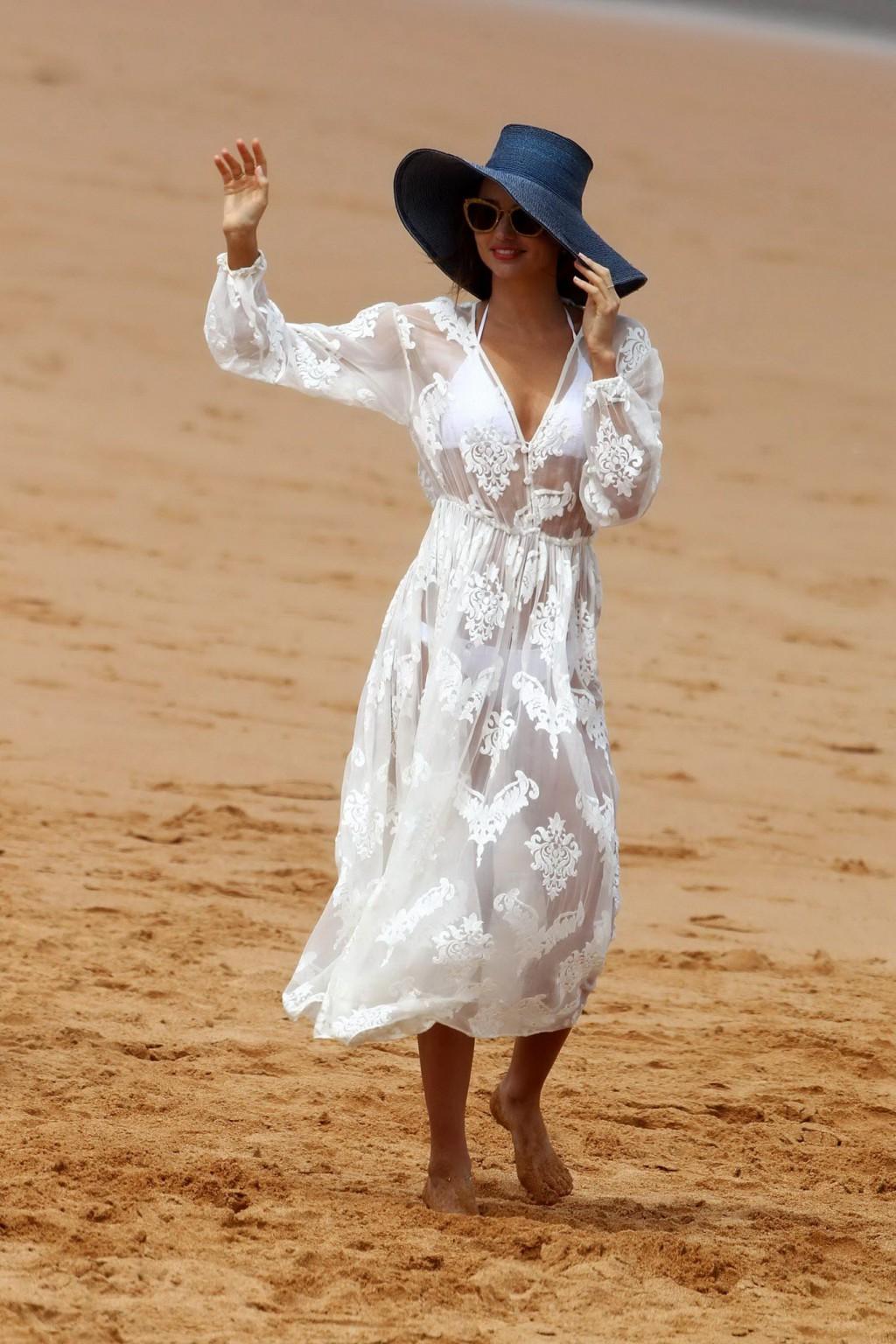 10P Miranda Kerr flashing her pussy in see through panties at the Kora Organics phot