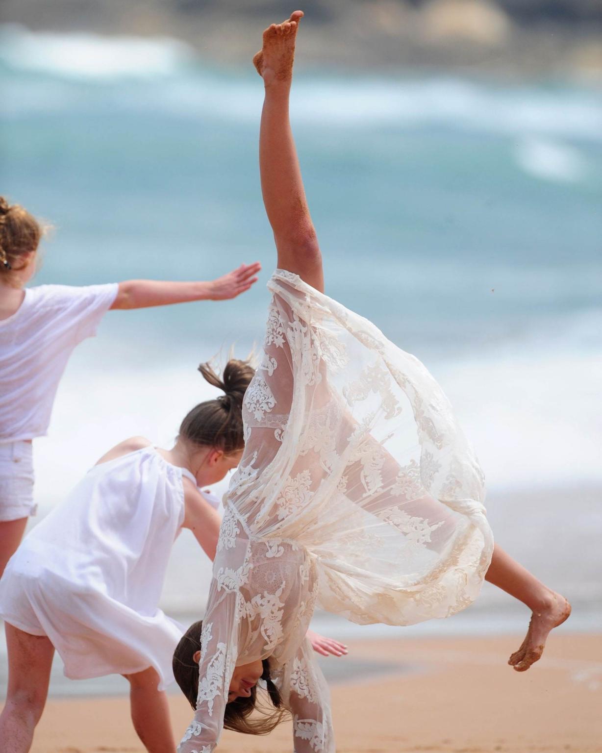 10P Miranda Kerr flashing her pussy in see through panties at the Kora Organics phot