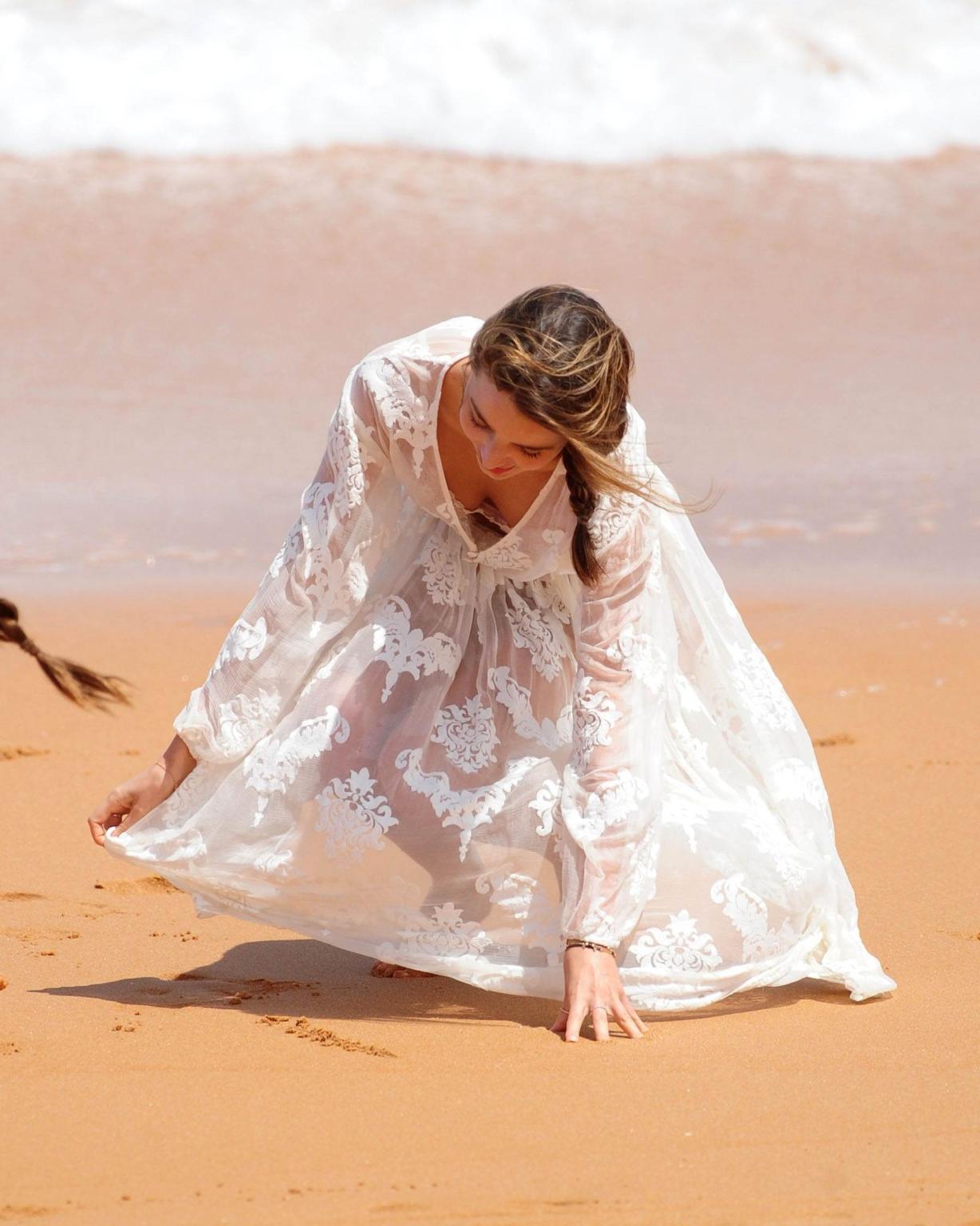 10P Miranda Kerr flashing her pussy in see through panties at the Kora Organics phot
