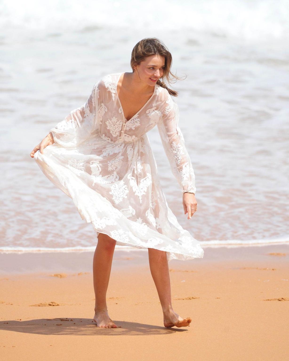 10P Miranda Kerr flashing her pussy in see through panties at the Kora Organics phot